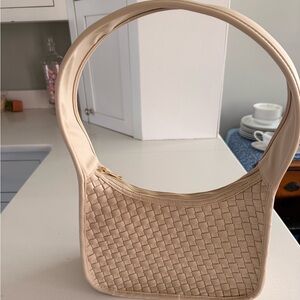 Anthropologie woven neoprene shoulder bag in beige. Took tags off but never used